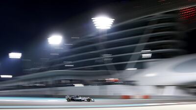 British driver Lewis Hamilton races to victory at Yas Marina Circuit on November 23, 2014. Christopher Pike / The National