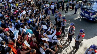 Protesters stage a rally in front of the Thai embassy in Yangon on December 25, 2015, after a Thai court sentenced two Myanmar migrant workers to death for the murder of two British tourists in southern Thailand. Lynn Bo Bo / EPA