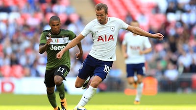 Harry Kane and Tottenham Hotspur start their Premier League season against Newcastle United on Sunday. Stephen Pond / Getty Images