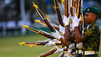 TOPSHOT - Sri Lanka Police Special Task Force (STF) commandos perform during the 156th Sri Lanka Police Day celebrations in Colombo on September 3, 2022. (Photo by Ishara S. KODIKARA / AFP)