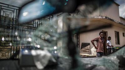 The windscreen of a car inside of Gabon’s opposition leader Jean Ping’s headquarters in Libreville is shattered. Post-election violence in Gabon has claimed two more lives, sources said September 2, after President Ali Bongo was proclaimed winner of last week’s vote while main challenger Jean Ping claimed victory for himself. One of the two new victims was a policeman, the first member of the Gabonese security forces listed as killed in the violence sparked by the announcement on August 31 of Bongo’s victory in last weekend’s election. Marco Longari / AFP