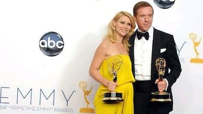 Claire Dane, left, and Damien Lewis won the awards for outstanding lead actor and actress in a drama series for Homeland. AP