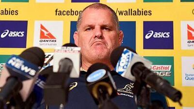 Australian rugby union coach Ewen McKenzie reacts during a press conference as Australian rugby is in turmoil amid two investigations into alleged misbehaviour by star player Kurtley Beale towards team business manager Di Patston and the loss of their last two Test matches. AFP PHOTO/William WEST