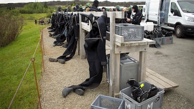 Dry suits and snorkelling equipment are needed to brave the sub-zero temperatures. Photo: Jeremie Richard / AFP