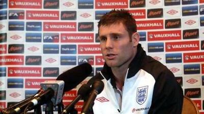 James Milner, above, says caretaker manager Stuart Pearce can handle the pressure of coaching England.