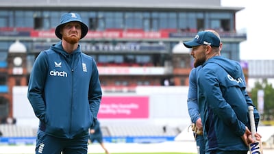 England captain Ben Stokes and coach Brendon McCullum on the pitch on Day 5 of the fourth Ashes Test at Old Trafford. Getty