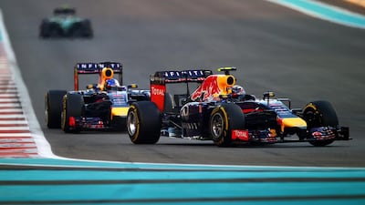 Daniel Ricciardo and Sebastian Vettel make their way through the field after both Red Bulls started from the pitlane. Clive Rose / Getty Images