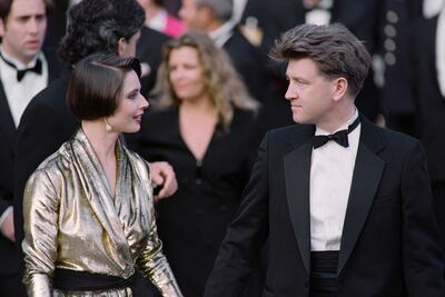 David Lynch with Italian actress Isabella Rossellini at the Cannes Film Festival in 1990. AFP