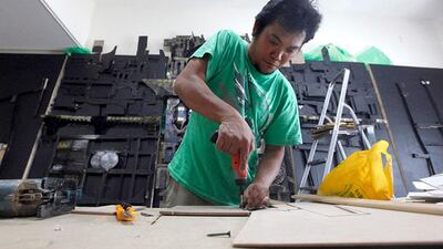 Darwin 'Japat' Guevarra, a highly regarded Filipino artist, creates a mixed media artwork that measures 9 meters by 3 meters. Japat painstakingly drew, cut out, rivited and painted each component which was then divided into seven parts and reconnected when put on display. The artwork was featured in the Outdoor Art Project 2012. Jeffrey E Biteng / The National