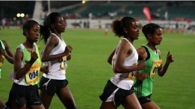 Alia Mohammed Saeed, right, and Bethlem Desalyn, both in white, did not have a good night in Dubai. Sammy Dallal / The National