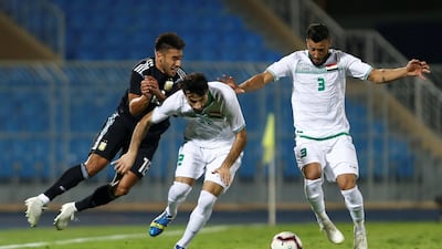 Iraq's Rebin Sulaka and Hussam Kadhim in action with Argentina's Eduardo Salvio during the Argentina vs Iraq football match at the Prince Faisal bin Fahd Stadium, Riyadh, Saudi Arabia. Reuters