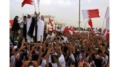 Shiites demonstrate outside King Hamad bin Isa Al Khalifa's Safriya palace in Sadad, Bahrain, southwest of Manama.