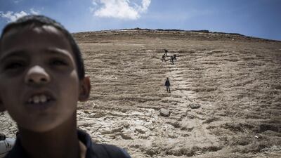 A pupil walks home after a day of lessons.