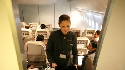 An Etihad Airways crew member attends a class training session introducing new equipment and products at the Etihad Training Facilities in Abu Dhabi. Rich-Joseph Facun / The National