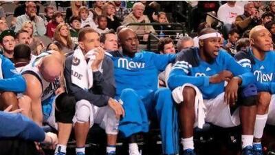 Lamar Odom, centre, and the Dallas Mavericks have decided it would be best if the reigning league Sixth Man did not play for the team the remainder of the season.