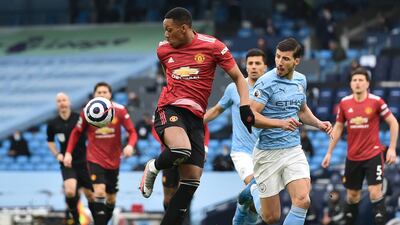 Anthony Martial - 8: Started as the central striker and won a penalty after 34 seconds after being fouled by Gabriel Jesus. Looked dangerous when the ball came to him – as he did in the equivalent fixture last season. Ran at City defenders and held them off throughout. Had two superb chances to make it 3-0, the first a header, the second a shot. Did we see him smile in the second half? We did. It has been a while. EPA