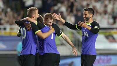 Harry Kane celebrates with teammate Son Heung-min after scoring the first goal. Getty