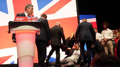 The protester is detained. PA