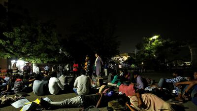 Students sit inside a Madras University compound during a protest in Chennai. Reuters