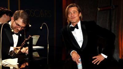 Best Supporting Actor Brad Pitt waits for his Oscar statue to be engraved at the Governors Ball after the Oscars on Sunday, February 9, 2020, at the Dolby Theatre in Los Angeles. Reuters