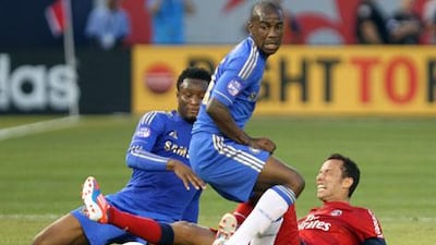 Gael Kakuta and John Mikel Obi provide stiff resistance to PSG's Nene