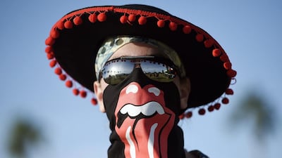 Nevin Dedmun of Lebanon, New Hampshire, wears a Rolling Stones bandana during day 3 of the 2016 Desert Trip music festival at Empire Polo Field in Indio, California. Chris Pizzello / Invision / AP