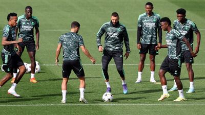 Real Madrid forward Karim Benzema training with teammates. AFP
