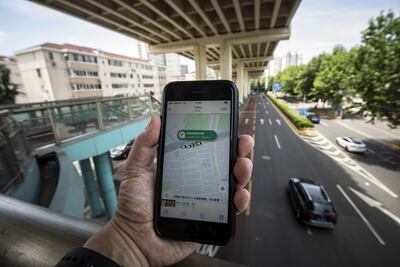 The Didi ride-hailing app on a smartphone in Shanghai, China. Bloomberg
