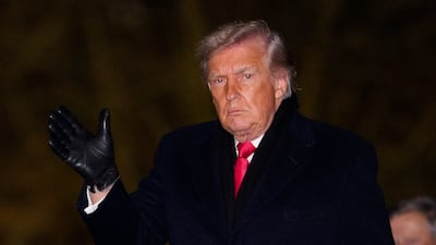 US President Donald Trump arrives at the White House, before preparing to head to Davos. EPA