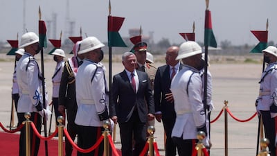 Iraqi President Barham Salih receives Jordanian King Abdullah II at Baghdad Airport. AFP