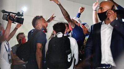 Paris Saint-Germain's Brazilian forward Neymar (L) celebrates with teammates at the PSG team hotel in Lisbon. AFP