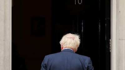 British Prime Minister Boris Johnson leaves after announcing his resignation, on July 7, 2022. Reuters