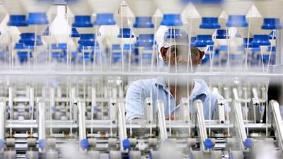 The 44,250 square metre factory, which is estimated to make Dh140m in sales per year, has a capacity of 45,600 spindles and employs a labour force of about 225 people. Pawan Singh / The National