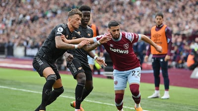 Said Benrahma of West Ham United battles for possession with Ben White and Bukayo Saka of Arsenal. Getty Images