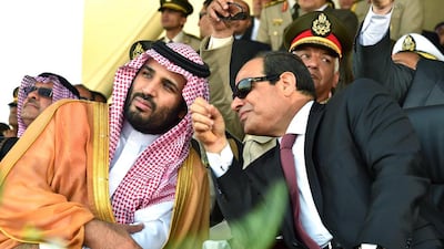 Egyptian president Abdel Fattah El Sisis (R) sits with Saudi Deputy Crown Prince and minister of defence Mohammed bin Salman during a graduation ceremony of a military academy in Cairo on July 30, 2015. EPA/Office of the Egyptian president/Handout