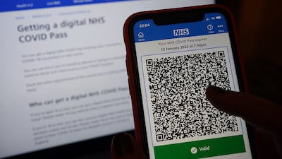 An NHS Covid Pass. PA