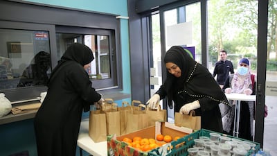 Happy volunteers at the philanthropic 'Iftar for All' project in North London during Ramadan 2020. Getty Images