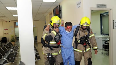 Dubai Municipality, with Dubai Police, Civil Defence and Dubai Ambulance Service, conducts an evacuation drill at a Dubai Municipality Clinic. Drills will help to train security staff and identify people with particular needs during an evacuation. Courtesy Government of Dubai