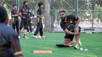 Rameez gives slip catching practice