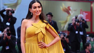 Media personality Diala Makki, in a mustard one-shoulder gown. Getty Images