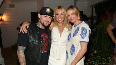 Rock star Benji Madden and Cameron Diaz, who got married on Monday, with author Vicky Vlachonis, in May 2014 in Los Angeles. Jason Kempin/Getty Images for Goop/AFP