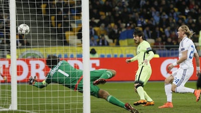Football Soccer - Dynamo Kiev v Manchester City - UEFA Champions League Round of 16 First Leg - NSC Olimpiyskiy Stadium, Kiev, Ukraine - 24/2/16David Silva scores the second goal for Manchester CityReuters / Valentyn OgirenkoLivepicEDITORIAL USE ONLY.