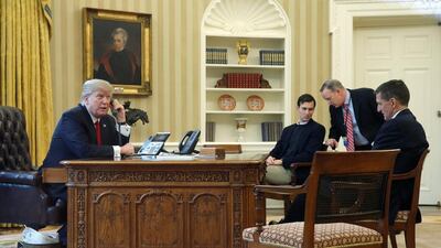 Donald Trump speaks by phone with Saudi Arabia's King Salman in the Oval Office at the White House. Jonathan Ernst / Reuters