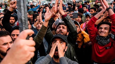 Protesters chant slogans during an anti-government demonstration, also calling for freedom of the press, in the southern Iraqi city of Basra. AFP