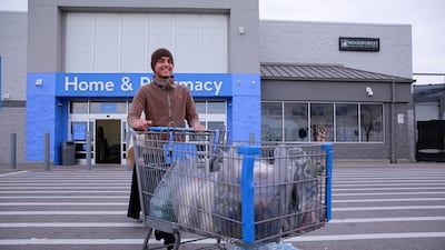 An Afghan refugee goes grocery shopping in the US. Reuters