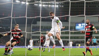 Daniele De Rossi of AS Roma touches in their second goal to equalise 2-2 in the first half against Bayer Leverkusen on Tuesday night. Dean Mouhtaropoulos / Bongarts / Getty Images