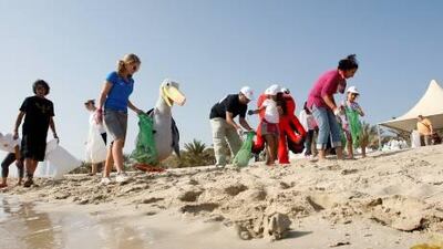 Volunteers collect litter on Lulu Island.