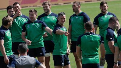 Ireland rugby player Johnny Sexton, centre, gestures during their training session at the Hakatanomori Stadium. AP