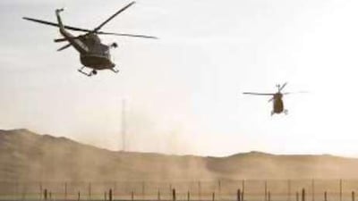 Liwa Oasis, Abu Dhabi - October 29, 2008: Search and Rescue helicopters from Abu Dhabi Police take off from the Helipad at the Moreeb Hill bivouac.