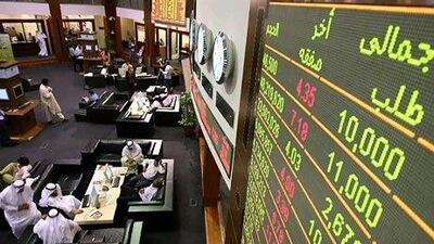 Traders at the Dubai Financial Marketai. Pawan Singh / The National